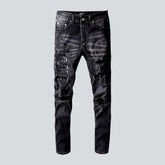 Schwarze Herrenjeans im Used-Look mit Whiskers